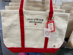 The Signature Canvas Tote Bag–Red "What's in the Bag?" Embroidered